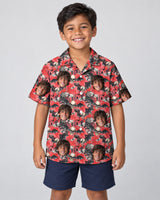 Spooky Bat Halloween Hawaiian shirt with printed faces, worn by a child