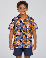 Spooky Kitty Halloween Hawaiian shirt with printed faces, worn by a child