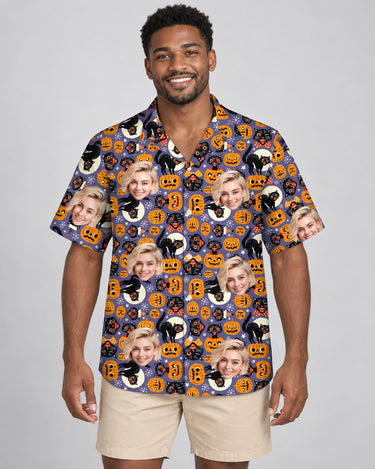 Spooky Kitty Halloween Hawaiian shirt with printed faces, worn by a man
