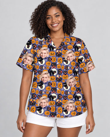 Spooky Kitty Halloween Hawaiian shirt with printed faces, worn by a woman