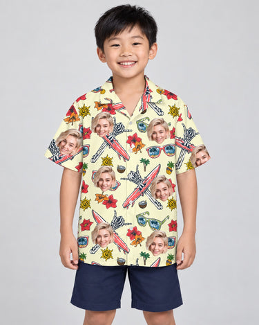 Spooky Surf Skull Hawaiian shirt with printed faces, worn by a child