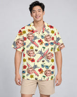Spooky Surf Skull Hawaiian shirt with printed faces, worn by a man