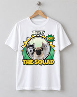 White custom pet hero shirt on a wooden hanger with three pets, a green cape, yellow burst and THE SQUAD name beneath the MIGHTY title.