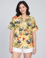 Surf's Up Island Hawaiian shirt with printed faces, worn by a woman