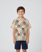 Surfboard Pines Christmas Hawaiian Shirt with printed faces, worn by a child