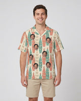 Surfboard Pines Christmas Hawaiian Shirt with printed faces, worn by a man