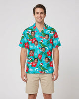 Surfing T-Rex Santa Dinosaur Christmas Hawaiian Shirt with printed faces, worn by a man