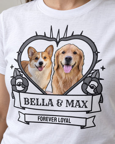 Close-up of a white tattoo pet shirt with grayscale roses and heart, two full-color dog portraits, a Bella and Max scroll and Forever Loyal text.