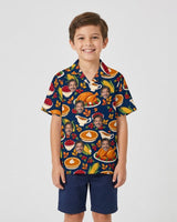 Thanksgiving Feast Hawaiian Shirt with printed faces, worn by a child