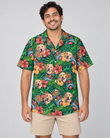 Tiki Paradise Warrior Hawaiian shirt with printed faces, worn by a man