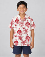 Toile de Jouy Palm Hawaiian shirt with printed faces, worn by a child