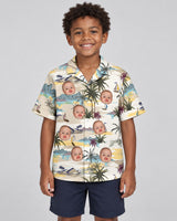 Tranquil Island Hawaiian shirt with printed faces, worn by a child