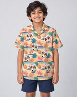Tropical Bloom Hawaiian shirt with printed faces, worn by a child