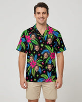 Tropical Fireworks Christmas Hawaiian Shirt with printed faces, worn by a man