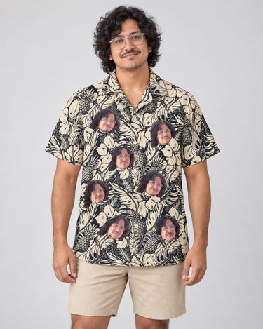 Tropical Garden Elegance Hawaiian shirt with printed faces, worn by a man