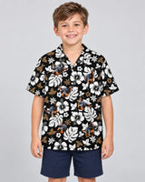 Tropical Hibiscus Flower Hawaiian shirt with printed faces, worn by a child