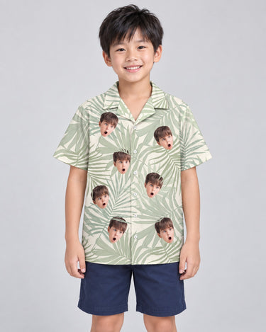 Tropical Leaf Dreams Hawaiian shirt with printed faces, worn by a child
