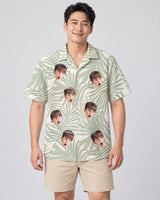Tropical Leaf Dreams Hawaiian shirt with printed faces, worn by a man