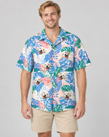 Tropical Leaf Fusion Hawaiian shirt with printed faces, worn by a man