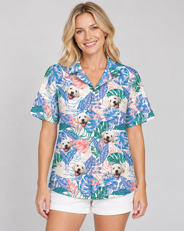 Tropical Leaf Fusion Hawaiian shirt with printed faces, worn by a woman