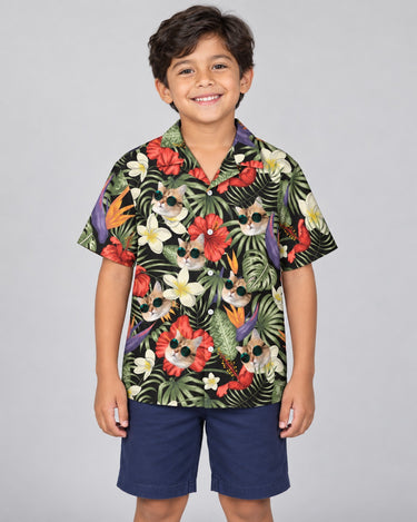Tropical Oasis Hawaiian shirt with printed faces, worn by a child
