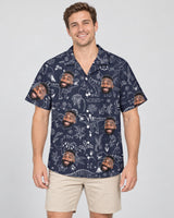 Tropical T-Rex Bloom Hawaiian shirt with printed faces, worn by a man
