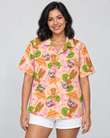 Tropical Tiki Grill Fest Hawaiian shirt with printed faces, worn by a woman