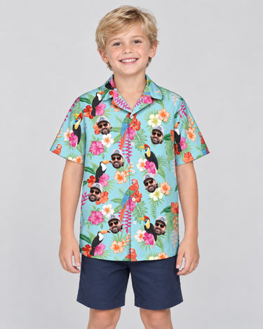 Tropical Toucan Macaw Paradise Hawaiian shirt with printed faces, worn by a child