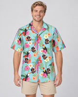 Tropical Toucan Macaw Paradise Hawaiian shirt with printed faces, worn by a man