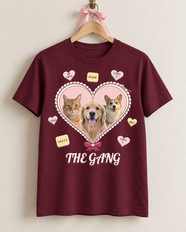 Maroon custom candy heart pet shirt on a wooden hanger, showing three pet portraits, red ribbon accents and The Gang script lettering with no second line.