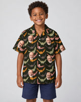Vampire Night Bat Halloween Hawaiian shirt with printed faces, worn by a child