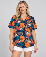 Vibrant Tropical Floral Hawaiian shirt with printed faces, worn by a woman