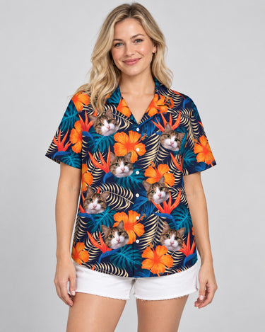 Vibrant Tropical Floral Hawaiian shirt with printed faces, worn by a woman