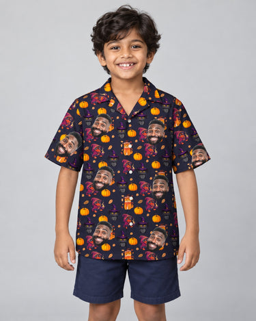 Vintage Black Cat Halloween Hawaiian shirt with printed faces, worn by a child