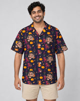 Vintage Black Cat Halloween Hawaiian shirt with printed faces, worn by a man