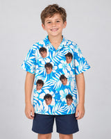 Vintage Hibiscus Vibes Hawaiian shirt with printed faces, worn by a child