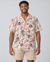 Vintage Palm Hibiscus Hawaiian shirt with printed faces, worn by a man
