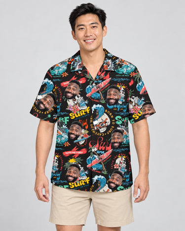 Vintage Skull Surf Hawaiian shirt with printed faces, worn by a man