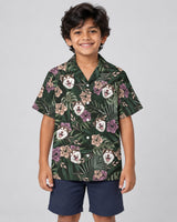 Vintage Tropical Natural Hawaiian shirt with printed faces, worn by a child