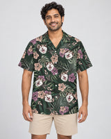 Vintage Tropical Natural Hawaiian shirt with printed faces, worn by a man