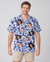Weathered Tropic Hibiscus Hawaiian shirt with printed faces, worn by a man