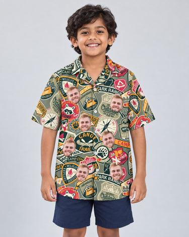 Wilderness Adventure Hawaiian shirt with printed faces, worn by a child