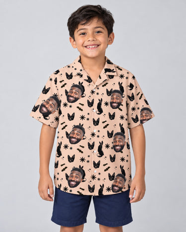 Witchy Black Cat Halloween Hawaiian shirt with printed faces, worn by a child