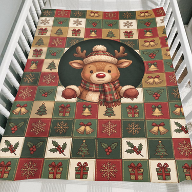 Cozy Reindeer Holiday Squares winter blanket folded over the side of a wooden crib as a cozy Christmas gift