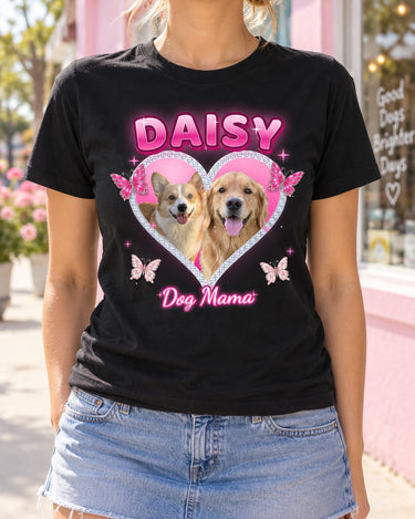 Woman wearing a black Y2K pet photo t-shirt with a golden retriever and a corgi in a pink rhinestone heart and the name Daisy
